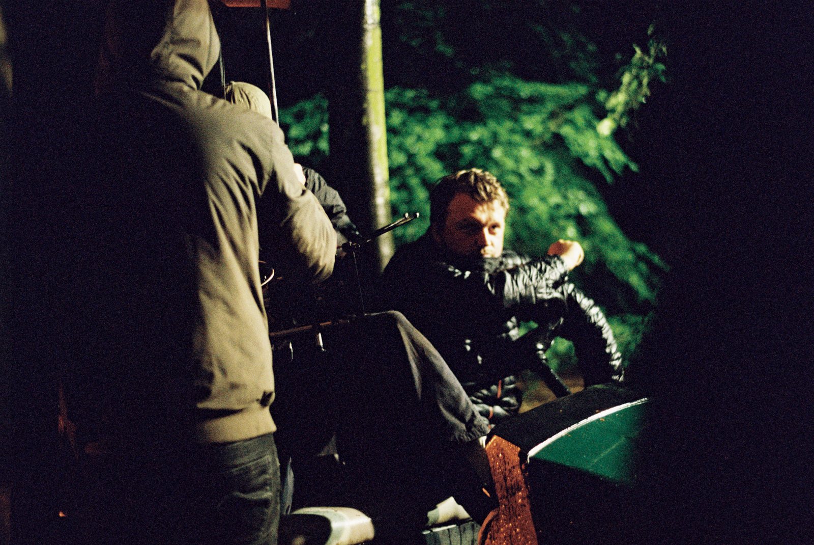 Max Mason directing at night on set